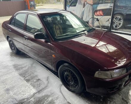 Червоний Міцубісі Lancer, об'ємом двигуна 1.3 л та пробігом 275 тис. км за 1500 $, фото 3 на Automoto.ua