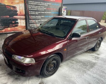 Червоний Міцубісі Lancer, об'ємом двигуна 1.3 л та пробігом 275 тис. км за 1500 $, фото 1 на Automoto.ua