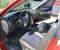 Красный Мицубиси Лансер, объемом двигателя 1.3 л и пробегом 396 тыс. км за 2800 $, фото 6 на Automoto.ua