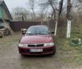 Червоний Міцубісі Lancer, об'ємом двигуна 1.3 л та пробігом 330 тис. км за 2200 $, фото 1 на Automoto.ua