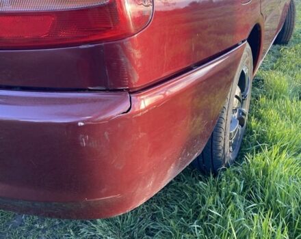 Красный Мицубиси Лансер, объемом двигателя 1.3 л и пробегом 182 тыс. км за 3000 $, фото 5 на Automoto.ua