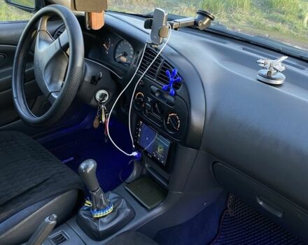 Красный Мицубиси Лансер, объемом двигателя 1.3 л и пробегом 182 тыс. км за 3000 $, фото 9 на Automoto.ua