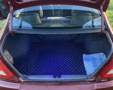 Красный Мицубиси Лансер, объемом двигателя 1.3 л и пробегом 182 тыс. км за 3000 $, фото 6 на Automoto.ua