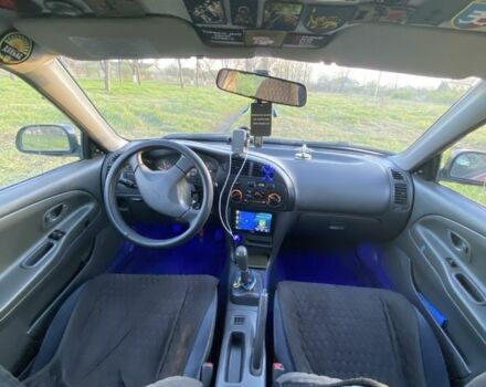 Красный Мицубиси Лансер, объемом двигателя 1.3 л и пробегом 182 тыс. км за 3000 $, фото 8 на Automoto.ua