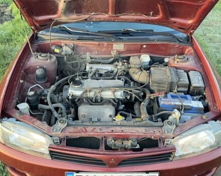 Красный Мицубиси Лансер, объемом двигателя 1.3 л и пробегом 182 тыс. км за 3000 $, фото 7 на Automoto.ua