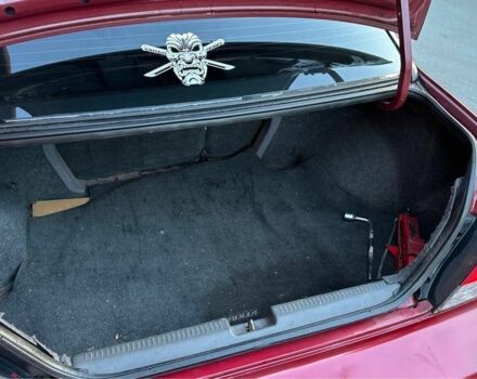 Красный Мицубиси Лансер, объемом двигателя 2 л и пробегом 350 тыс. км за 3399 $, фото 6 на Automoto.ua