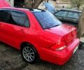 Красный Мицубиси Лансер, объемом двигателя 2 л и пробегом 0 тыс. км за 3500 $, фото 1 на Automoto.ua