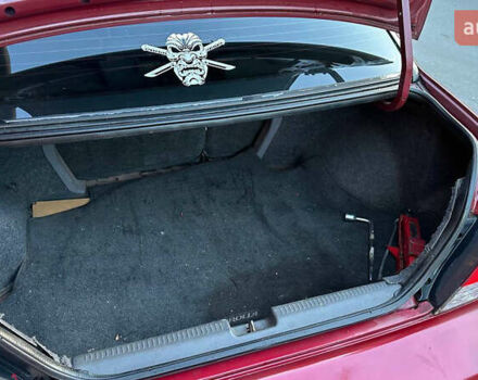 Красный Мицубиси Лансер, объемом двигателя 2 л и пробегом 202 тыс. км за 2599 $, фото 8 на Automoto.ua