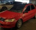 Червоний Міцубісі Lancer, об'ємом двигуна 2 л та пробігом 220 тис. км за 3300 $, фото 1 на Automoto.ua
