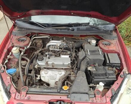 Міцубісі Lancer 2003 у Харкові на Automoto.ua Червоний Міцубісі Lancer, об'ємом двигуна 1.6 л та пробігом 302 тис. км за 3800 $, фото 8 на Automoto.ua