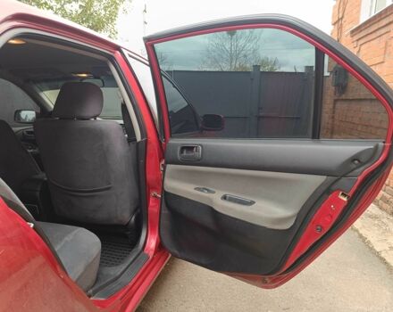 Міцубісі Lancer 2003 у Харкові на Automoto.ua Червоний Міцубісі Lancer, об'ємом двигуна 1.6 л та пробігом 302 тис. км за 3800 $, фото 7 на Automoto.ua