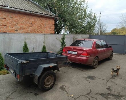 Міцубісі Lancer 2003 у Харкові на Automoto.ua Червоний Міцубісі Lancer, об'ємом двигуна 1.6 л та пробігом 302 тис. км за 3800 $, фото 16 на Automoto.ua