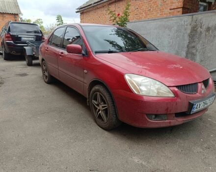 Міцубісі Lancer 2003 у Харкові на Automoto.ua Червоний Міцубісі Lancer, об'ємом двигуна 1.6 л та пробігом 302 тис. км за 3800 $, фото 15 на Automoto.ua