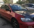 Червоний Міцубісі Lancer, об'ємом двигуна 2 л та пробігом 342 тис. км за 4999 $, фото 1 на Automoto.ua