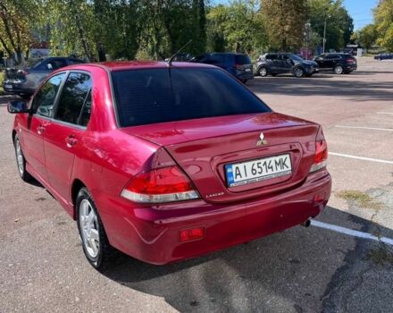 Червоний Міцубісі Lancer, об'ємом двигуна 1.6 л та пробігом 300 тис. км за 3300 $, фото 2 на Automoto.ua