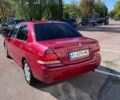Червоний Міцубісі Lancer, об'ємом двигуна 1.6 л та пробігом 300 тис. км за 3300 $, фото 2 на Automoto.ua