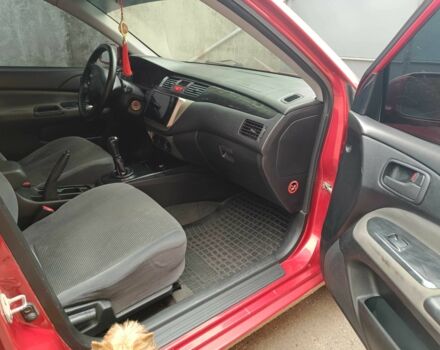 Міцубісі Lancer 2003 у Харкові на Automoto.ua Червоний Міцубісі Lancer, об'ємом двигуна 1.6 л та пробігом 302 тис. км за 3800 $, фото 14 на Automoto.ua