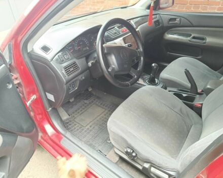 Міцубісі Lancer 2003 у Харкові на Automoto.ua Червоний Міцубісі Lancer, об'ємом двигуна 1.6 л та пробігом 302 тис. км за 3800 $, фото 10 на Automoto.ua