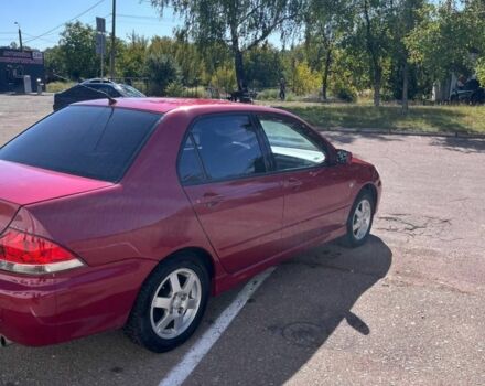 Червоний Міцубісі Lancer, об'ємом двигуна 1.6 л та пробігом 300 тис. км за 3300 $, фото 3 на Automoto.ua