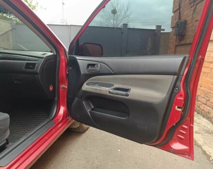 Міцубісі Lancer 2003 у Харкові на Automoto.ua Червоний Міцубісі Lancer, об'ємом двигуна 1.6 л та пробігом 302 тис. км за 3800 $, фото 6 на Automoto.ua