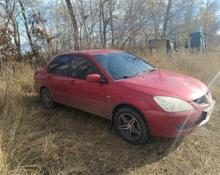 Міцубісі Lancer 2003 у Харкові на Automoto.ua Червоний Міцубісі Lancer, об'ємом двигуна 1.6 л та пробігом 302 тис. км за 3800 $, фото 1 на Automoto.ua