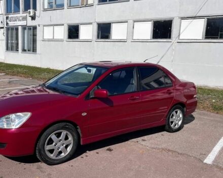 Червоний Міцубісі Lancer, об'ємом двигуна 1.6 л та пробігом 300 тис. км за 3300 $, фото 1 на Automoto.ua