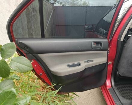 Міцубісі Lancer 2003 у Харкові на Automoto.ua Червоний Міцубісі Lancer, об'ємом двигуна 1.6 л та пробігом 302 тис. км за 3800 $, фото 4 на Automoto.ua