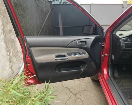 Міцубісі Lancer 2003 у Харкові на Automoto.ua Червоний Міцубісі Lancer, об'ємом двигуна 1.6 л та пробігом 302 тис. км за 3800 $, фото 3 на Automoto.ua
