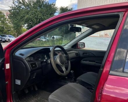 Червоний Міцубісі Lancer, об'ємом двигуна 1.6 л та пробігом 300 тис. км за 3300 $, фото 6 на Automoto.ua