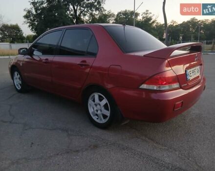 Красный Мицубиси Лансер, объемом двигателя 1.58 л и пробегом 250 тыс. км за 2999 $, фото 8 на Automoto.ua