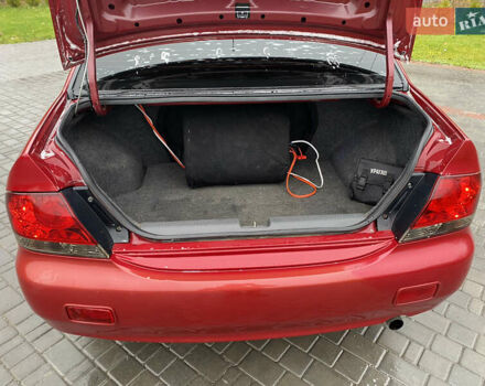 Червоний Міцубісі Lancer, об'ємом двигуна 1.58 л та пробігом 350 тис. км за 3600 $, фото 9 на Automoto.ua