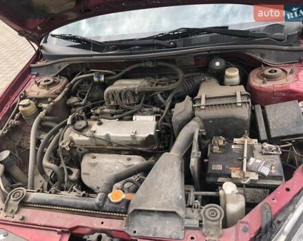 Красный Мицубиси Лансер, объемом двигателя 1.6 л и пробегом 224 тыс. км за 5500 $, фото 4 на Automoto.ua