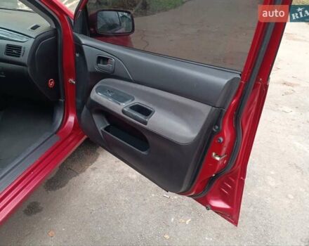 Червоний Міцубісі Lancer, об'ємом двигуна 1.3 л та пробігом 223 тис. км за 4250 $, фото 30 на Automoto.ua