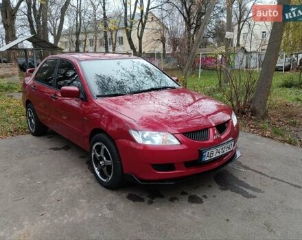 Червоний Міцубісі Lancer, об'ємом двигуна 1.3 л та пробігом 223 тис. км за 4250 $, фото 2 на Automoto.ua