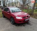 Червоний Міцубісі Lancer, об'ємом двигуна 1.3 л та пробігом 223 тис. км за 4250 $, фото 2 на Automoto.ua