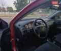 Красный Мицубиси Лансер, объемом двигателя 1.58 л и пробегом 250 тыс. км за 2999 $, фото 1 на Automoto.ua