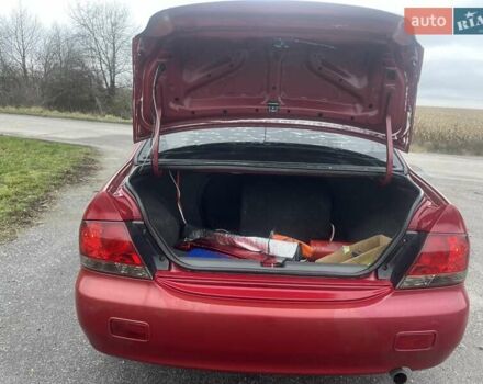 Красный Мицубиси Лансер, объемом двигателя 1.3 л и пробегом 250 тыс. км за 3450 $, фото 6 на Automoto.ua