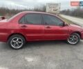Красный Мицубиси Лансер, объемом двигателя 1.3 л и пробегом 250 тыс. км за 3450 $, фото 4 на Automoto.ua