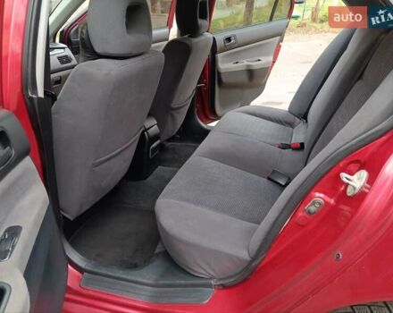 Червоний Міцубісі Lancer, об'ємом двигуна 1.3 л та пробігом 223 тис. км за 4250 $, фото 35 на Automoto.ua