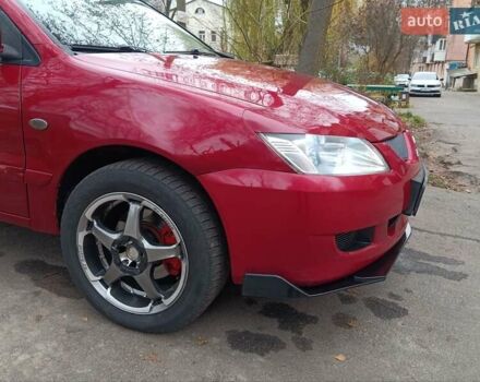 Червоний Міцубісі Lancer, об'ємом двигуна 1.3 л та пробігом 223 тис. км за 4250 $, фото 7 на Automoto.ua