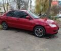 Червоний Міцубісі Lancer, об'ємом двигуна 1.3 л та пробігом 223 тис. км за 4250 $, фото 1 на Automoto.ua