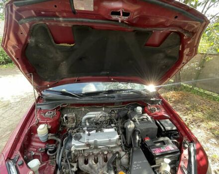 Червоний Міцубісі Lancer, об'ємом двигуна 1.3 л та пробігом 219 тис. км за 3600 $, фото 9 на Automoto.ua