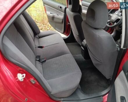 Червоний Міцубісі Lancer, об'ємом двигуна 1.3 л та пробігом 223 тис. км за 4250 $, фото 32 на Automoto.ua