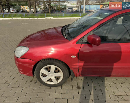 Червоний Міцубісі Lancer, об'ємом двигуна 1.58 л та пробігом 271 тис. км за 4100 $, фото 2 на Automoto.ua
