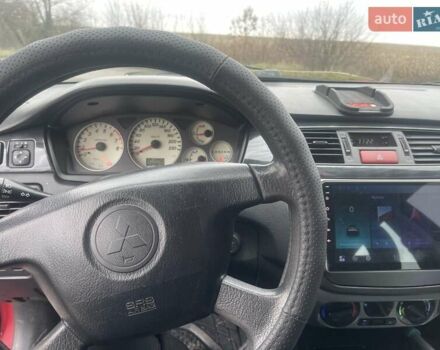 Красный Мицубиси Лансер, объемом двигателя 1.3 л и пробегом 250 тыс. км за 3450 $, фото 7 на Automoto.ua