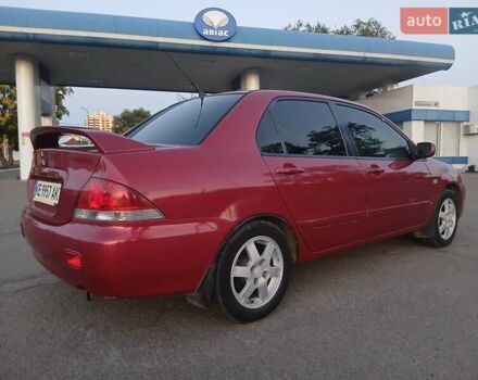 Красный Мицубиси Лансер, объемом двигателя 1.58 л и пробегом 250 тыс. км за 2999 $, фото 4 на Automoto.ua