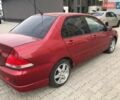 Красный Мицубиси Лансер, объемом двигателя 1.6 л и пробегом 224 тыс. км за 5500 $, фото 1 на Automoto.ua
