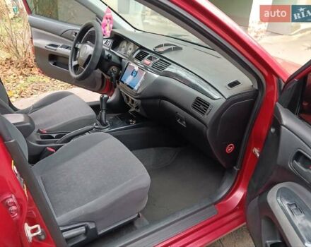 Червоний Міцубісі Lancer, об'ємом двигуна 1.3 л та пробігом 223 тис. км за 4250 $, фото 26 на Automoto.ua