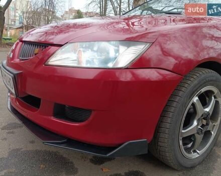 Червоний Міцубісі Lancer, об'ємом двигуна 1.3 л та пробігом 223 тис. км за 4250 $, фото 5 на Automoto.ua