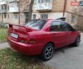 Червоний Міцубісі Lancer, об'ємом двигуна 1.3 л та пробігом 223 тис. км за 4250 $, фото 12 на Automoto.ua